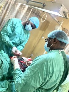 Father And Son Doctors Perform Surgery Together