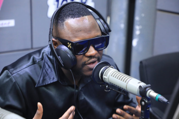 Medikal claims he is richer than Asake